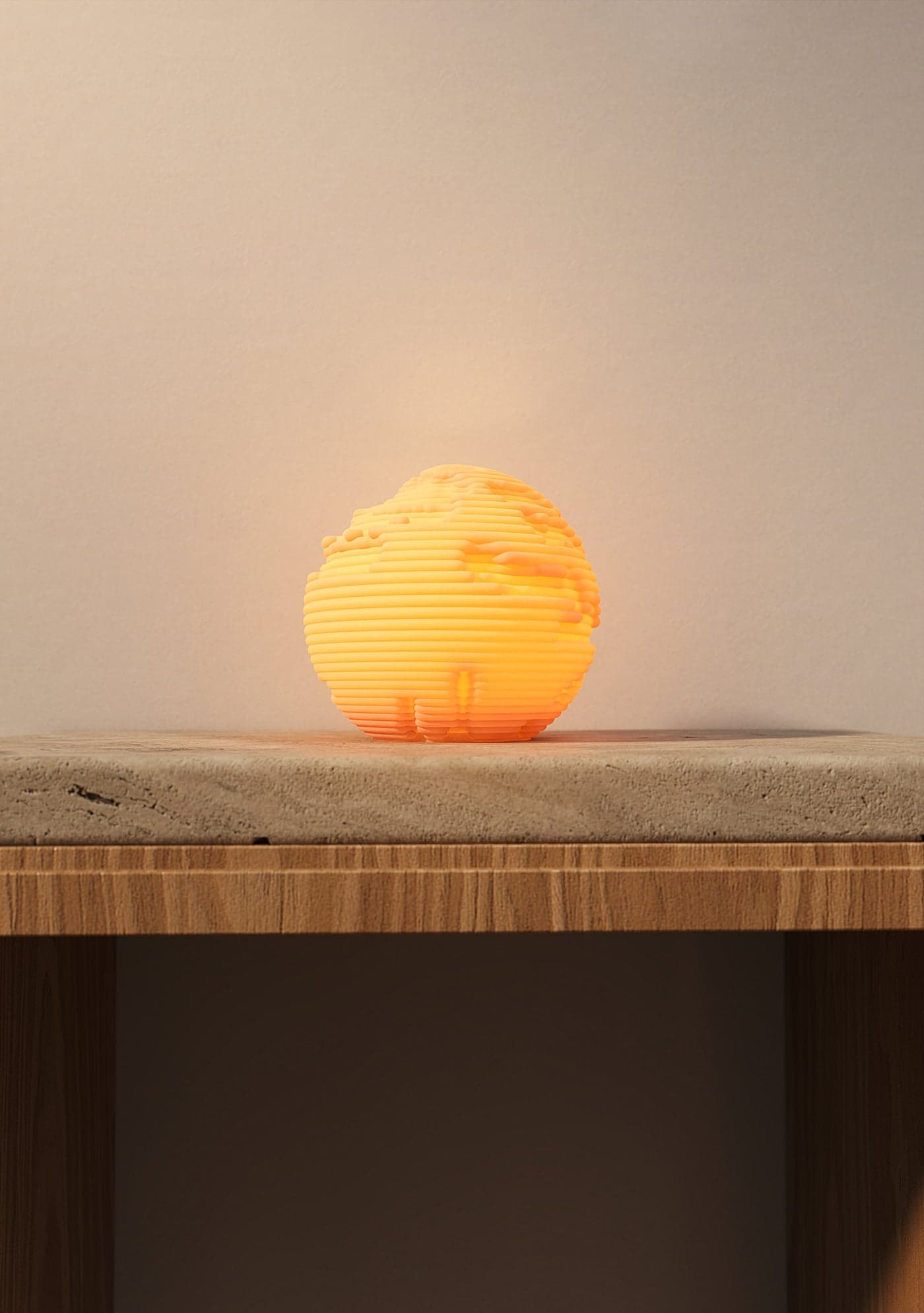 Erosion mini lamp lit on a wooden stool in a warm room